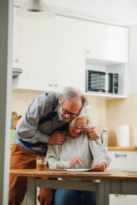 An Elderly Couple Hugging